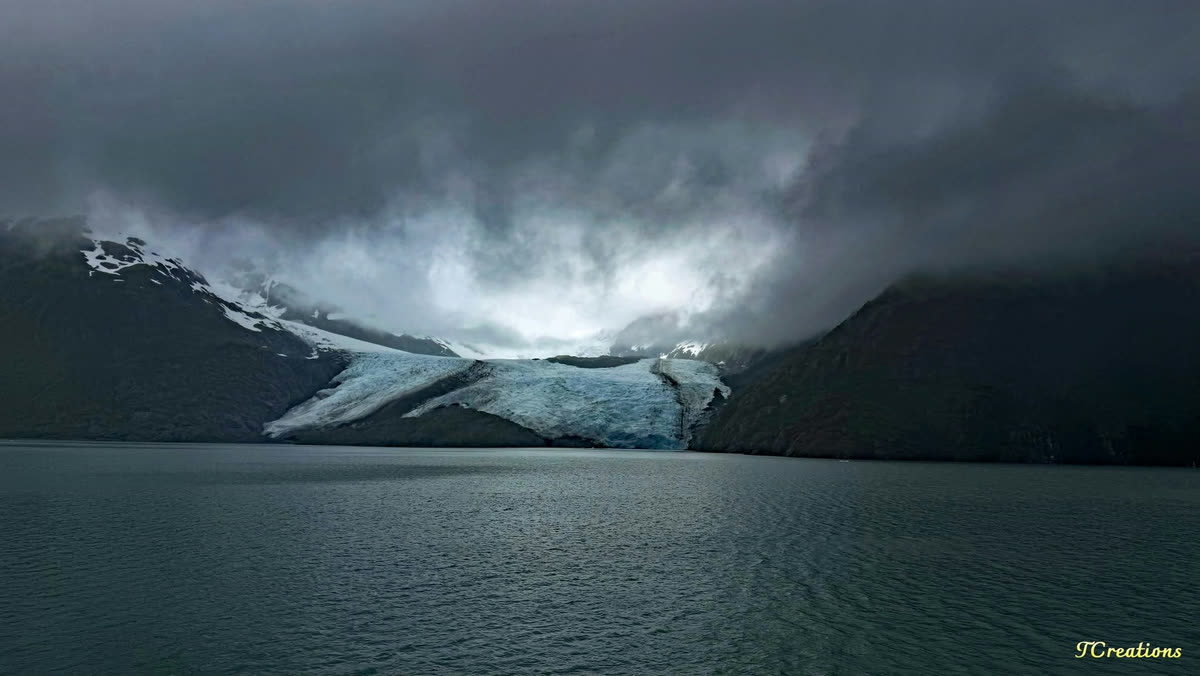 Storm light over a glacier face